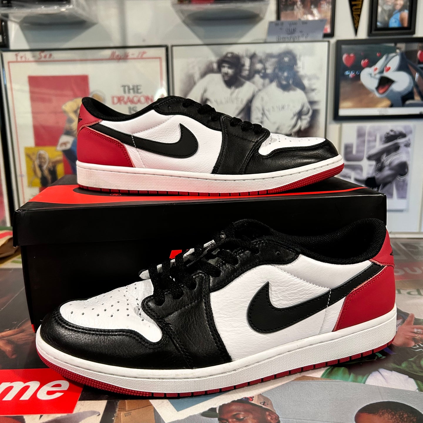 Black toe Jordan 1 lows